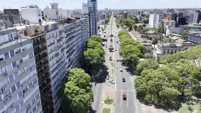 Drone flies along Boulevard General Artigas to Tres Cruces in Montevideo, Uruguay
