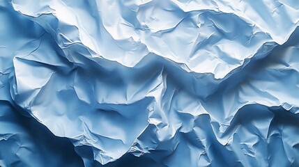 Obraz premium Crumpled blue paper texture background