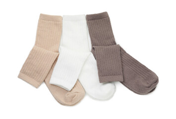 Pairs of soft socks isolated on white, top view