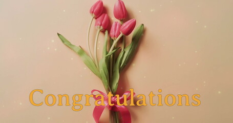 Fototapeta premium Image of congratulations text and stars over bunch of roses