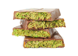 Pieces of Dubai chocolate bars with pistachio and knafeh isolated on white