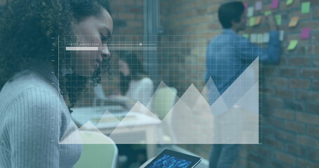 Image of data processing and diagrams over diverse business people discussing work