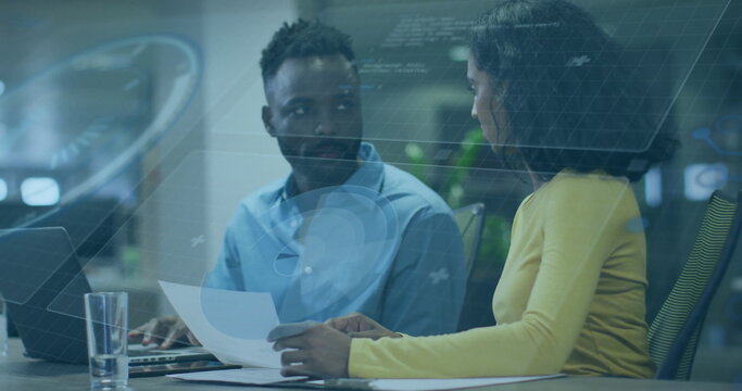 Image of data processing and diagrams over diverse business people discussing work