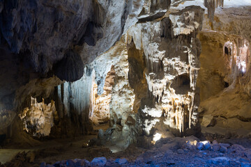 Image of dark cave of Demons in Southern France outdoors.