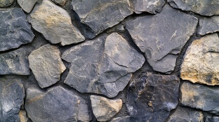 Obraz premium Close-up of a rustic stone wall texture.