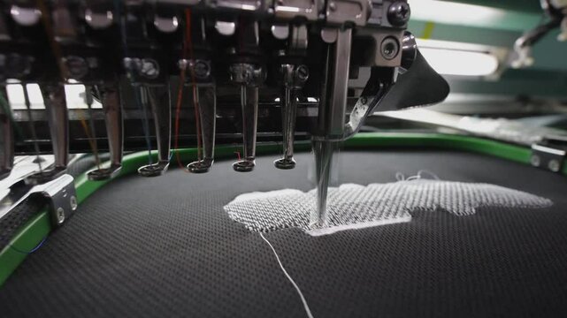 Embroidery machine Textile Industry at Garment Manufacturers Kota Kinabalu, Sabah, Malaysia.(selective focus and soft focus)