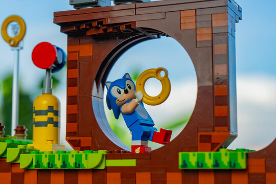 Depok, Indonesia - January 12, 2025: Lego toys photography, lego sonic the hedgehog on green hill zone, with sonic minifigure in action, blue sky background