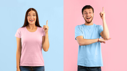 We Have Great Idea Concept. Young Funny Man And Woman Pointing Fingers Up. Couple Know Answer, Got Solution To Problem, Having Aha Moment Or Inspiration, Isolated On Blue And Yellow Studio Background