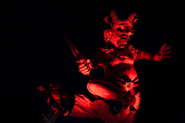 Traditional demon ogoh-ogoh at ritual parade of terrible monsters - Ngrupuk, which is held in...