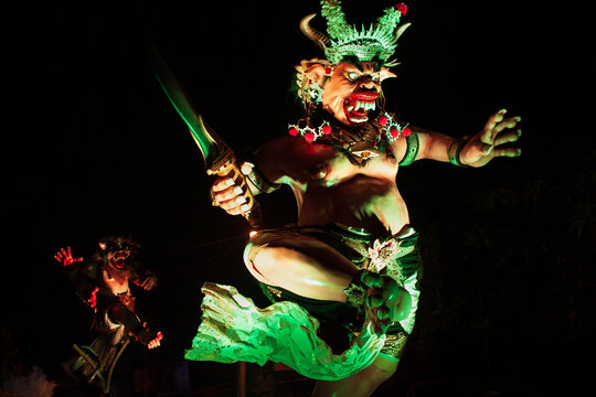 Traditional demon ogoh-ogoh at ritual parade of terrible monsters - Ngrupuk, which is held in evening of Nyepi - Balinese New Year before silence day. Arts and culture of Bali island people.
