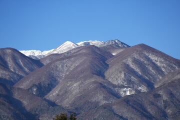 View of Mt. Kiso-Komagatake and Senjojiki Cirque from Komagane City, Nagano Prefecture in early morning of January 16, 2025