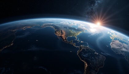 Naklejka premium Satellite view of Earth from space showing detailed continents and oceans illuminated by sunlight against a starry background