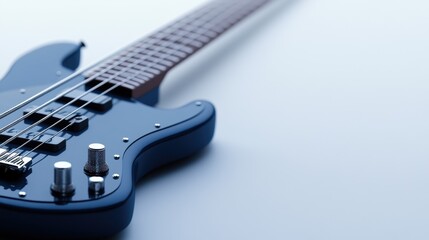 An electric bass guitar with a dark blue finish, placed on a clean white background, strings and knobs in focus.