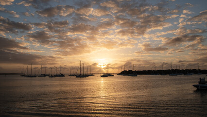 Naklejka premium Beautiful sunsets in Miami FL with wonderful colors and the sun saying Good Night.