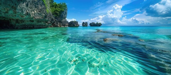 Obraz premium Crystal Clear Waters and Lush Greenery in a Tropical Paradise