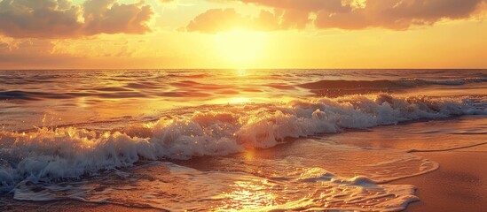 Fototapeta premium Golden Sunset Over a Calm Sea