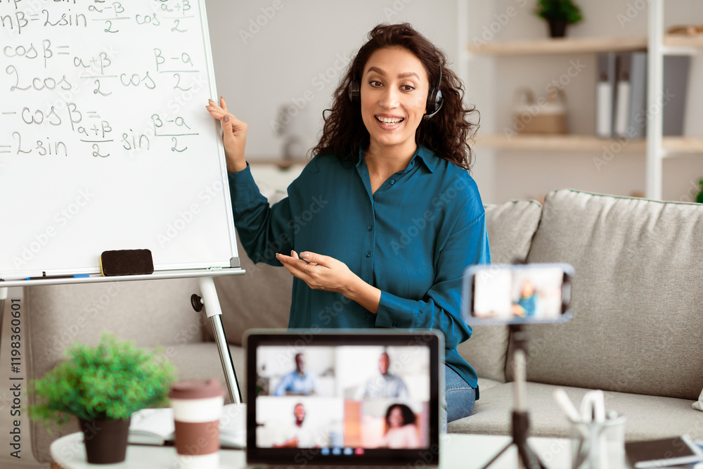 Poster Online Remote Learning. Professor in headset having video conference chat with students and class group using pc and cellphone on tripod, teaching from home during quarantine and covid outbreak