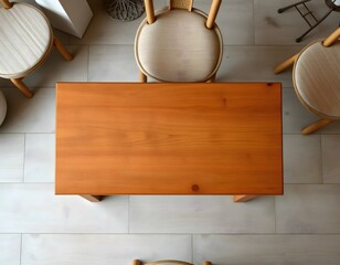 Empty wooden table surrounded by chairs in a modern minimalist dining room, seen from above