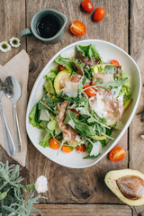 Parma ham salad served in a white plate 