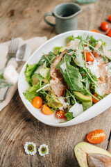 Parma ham salad served in a white plate 
