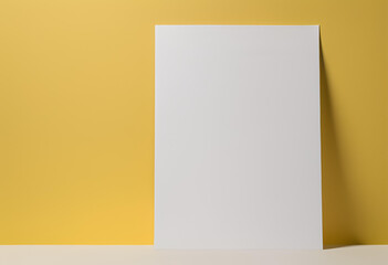 Blank white A4 paper mockup on yellow background.