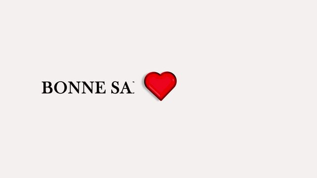 'happy valentin's day' in  French text "Joyeuse Saint-Valentin" on a crisp white background.