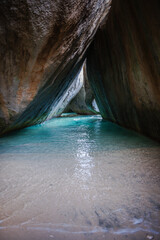 The Baths in Virgin Gorda, British Virgin Islands, is a collection of massive granite boulders as large as 40 foot in diameter, with white sand beaches and secret rock pools.