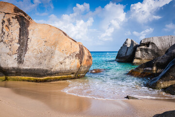The Baths in Virgin Gorda, British Virgin Islands,  is a collection of massive granite boulders as large as 40 foot in diameter, with white sand beaches and secret rock pools.