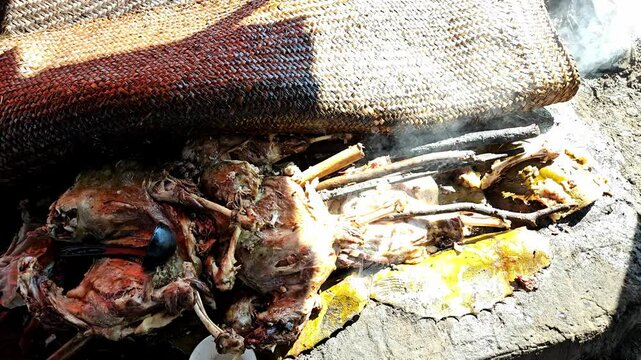 Original mexican barbacoa de hoyo with maguey leaves or slow cooker, mexican food, barbacoa hole