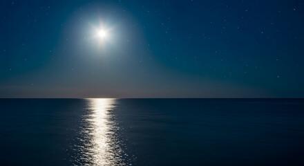 captivating and romantic seascape with a full moon casting its glow over the water at night.