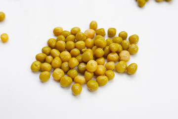 Canned green peas on white background.