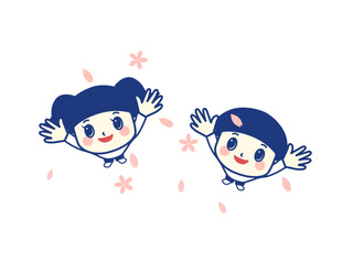 満開の舞い散る桜の花びらを見上げる子供たち