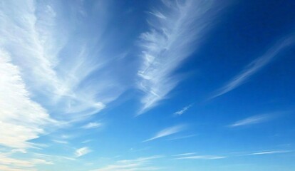 The blue sky background is decorated with thin and beautiful white clouds