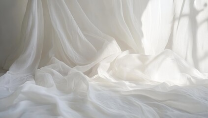 Obraz premium White fabric draped on floor, sunlight.
