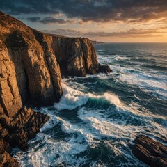 Fototapeta premium A dramatic rocky coastline with waves crashing against the cliffs at sunset.