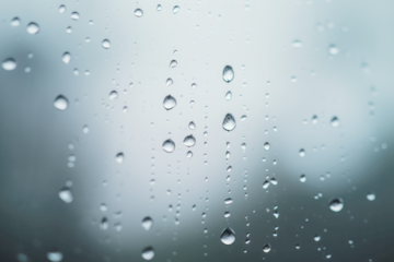 PNG Raindrops dripping on glass background droplets water.