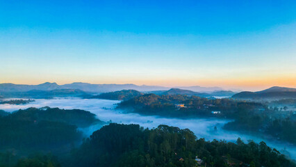 Beautiful Sunrise with misty mountains 