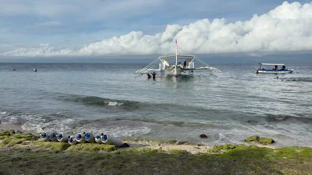 Bangka boats in Moal Boal, Philippines. Gas cylinders in the front.