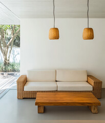 Cozy living room with natural light and wicker furniture in a modern home design