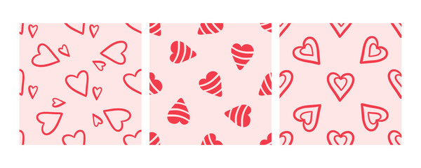 Seamless patterns with cute red hearts on pastel background