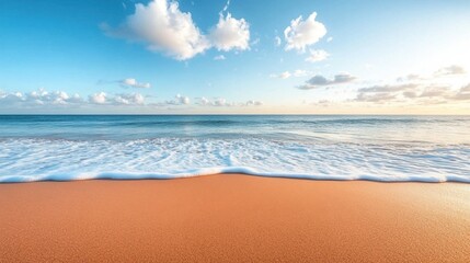 Tranquil Beach Scene with Gentle Waves and Blue Sky