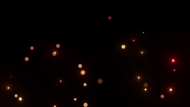 Burning embers glowing. Fire Glowing Particles on Black Background