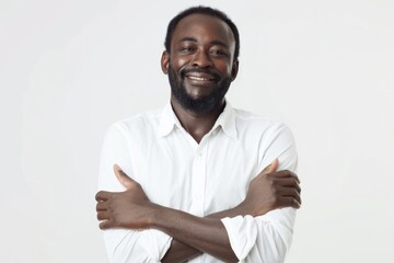 Portrait of African American man managing small shop with employees.