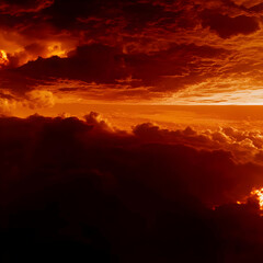 Fiery Sunset Sky Paints Clouds in Dramatic Hues of Orange and Red