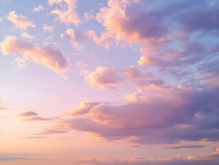Pink and Purple Cloudscape Illuminates the Sunset Sky with Soft Pastel Hues