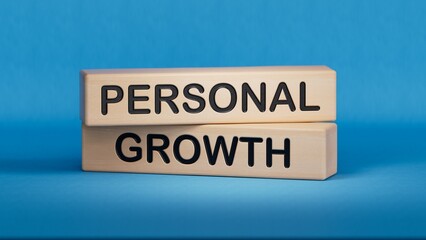 Personal growth symbol. Wooden blocks with words Personal growth.Business and Personal growth concept. Copy space.3D rendering on blue background.