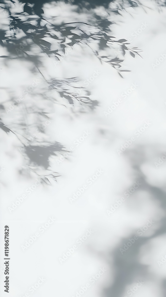 Aufkleber abstract shadows of leaves create a serene backdrop gently on a white surface.