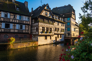 Fototapeta premium Traditional half-timbered houses on the canals district La Petite France in Strasbourg, Alsace, France. UNESCO World Heritage Site