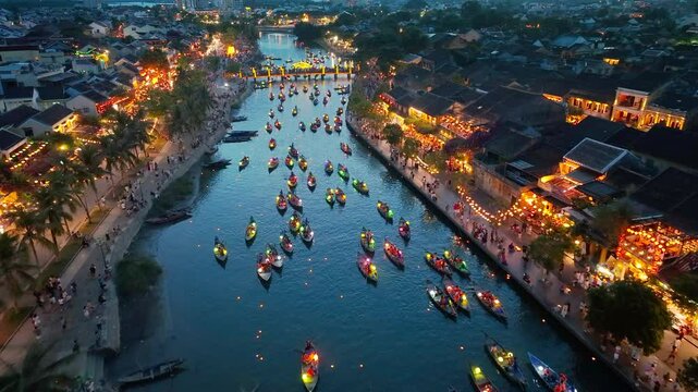 Hoi An ancient town at night. A beautiful night cruise decorated with Vietnamese paper lanterns Hoi An Ancient Town is a famous tourist attraction with its uniqueness, beauty and popularity in Vietnam