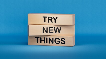 Try new Things symbol. Concept words Try new Things on wooden blocks.Business and Try new Things concept. Copy space.3D rendering on blue background.
